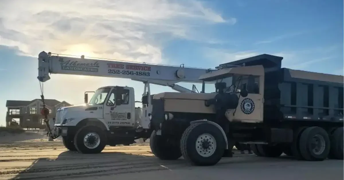 Crane service truck lifting HVAC unit in Kill Devil Hills, NC