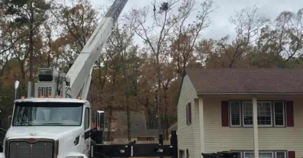 Mobile crane lifting materials at a North Carolina job site